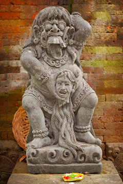 Vintage statue of the deity child-eating Rangda. Indonesia, Bali