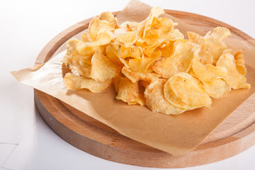 chips on a wooden plate