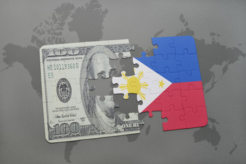 puzzle with the national flag of philippines and dollar banknote on a world map background.