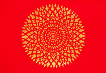 Traditional gold pattern on the ceiling in old temple. Bangkok,