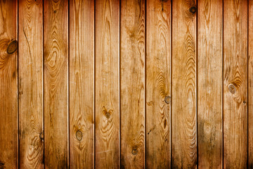 Wall covered with brown grunge wooden boards - natural backgroun
