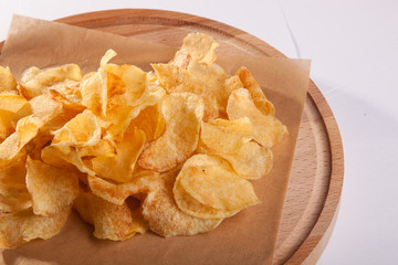 chips on a wooden plate