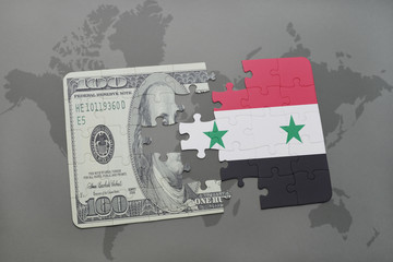 puzzle with the national flag of syria and dollar banknote on a world map background.
