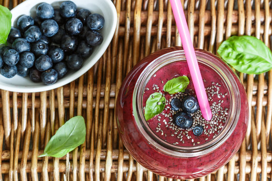 Healthy Breakfast. Summer dessert. Smoothies of blueberries with Chia seeds and fresh juicy berries. Selective focus