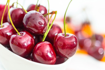 Fresh cherries in a bowl on the table