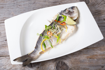 Steamed dorado fish