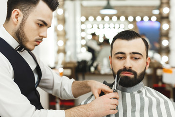 Barber making a beard