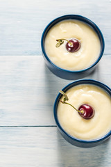 Custard with cherries