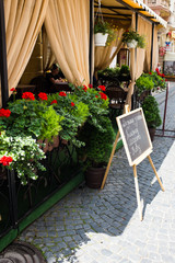 Summer terrace of city cafe on the street 