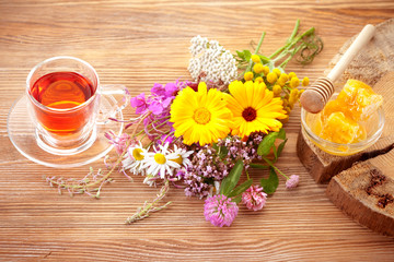 Obraz na płótnie Canvas Herbal tea, Herbs with honey