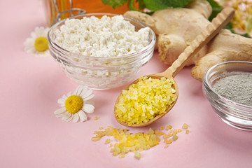 Natural ingredients for skin care on pink background
