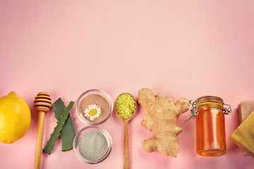 Fototapeta na wymiar Natural ingredients for skin care on pink background