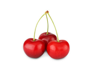 Fresh ripe cherry closeup isolated on white background