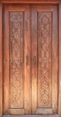 Ancient wooden door in temple thai