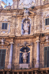 Fototapeta premium Old Town of the City of Palermo on Sicily in Italy, Europe. Vibrant Colors. Detail Picture of the historical architecture at the Four Corners, the Quattro Canti