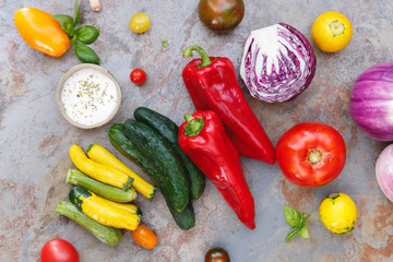 Ingredients for a colourful vegetable salad with a  spicy dressing