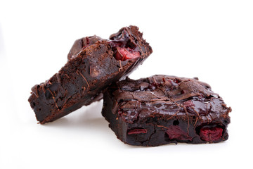 Delicious vegetarian brownie with cherries isolated on white bac