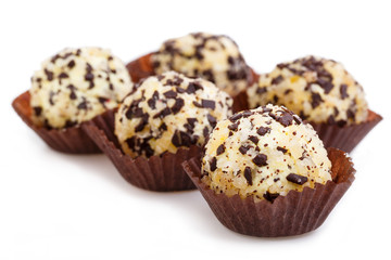 Homemade vegetarian truffle candies isolated on white background