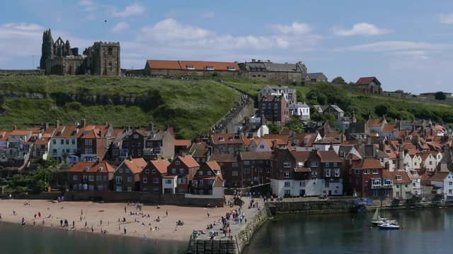 Time lapse clip of Whitby town showing the abbey in far distance