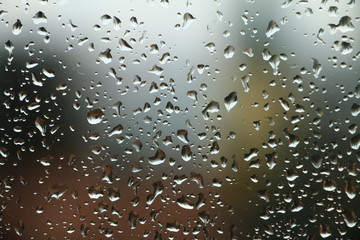 Rain drops on window , summer rainy day