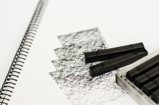 Charcoal sticks on drawing paper