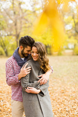 Young couple in the autumn park