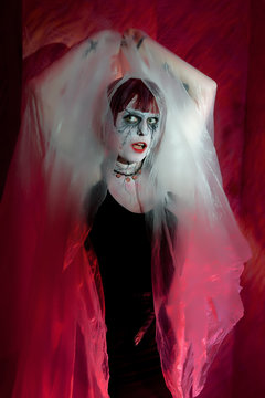 female zombie in misty mystical garb