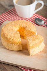 Sliced of Chiffon cake with cup coffee.