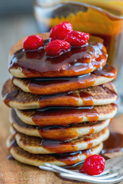Pancakes with caramel sauce closeup.