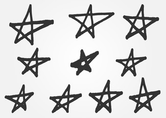 A set of distorted stars from the hand of a rough brush. Grunge sketch. 10 isolated abstract elements. - 116728522