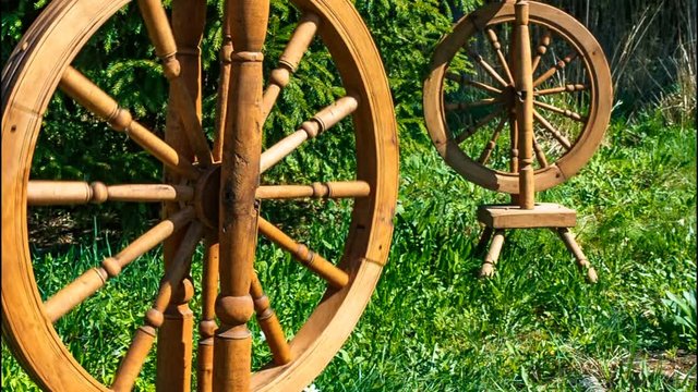 Old wooden spinning swirling amid the green park
