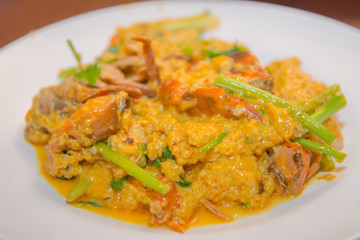 Fried crab in yellow curry , Stir-fried crab curry in Thailand.