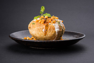 Rajasthani Shahi Raj Kachori, stuffed katchori with potato and sprout filling and served with curd,...