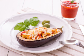 Grilled and filled eggplant half