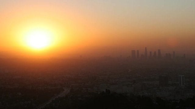 Time Lapse of sunrise with Hollywood and downtown Los Angeles in the foreground.
