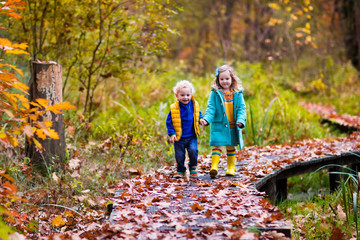 Kids playing in autumn park