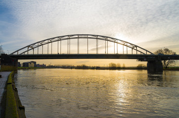 Fototapeta na wymiar arch bridge at sunrise