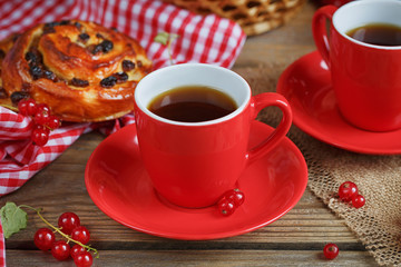 Fresh baked buns with a cup of coffee