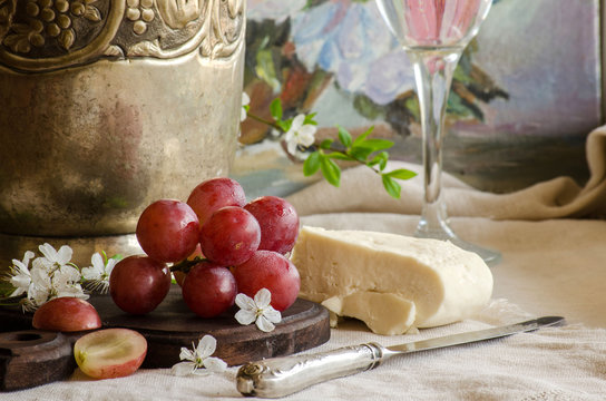 The grapes and goat cheese in the vintage interior.