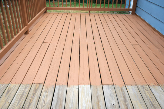 partially painted old wood deck
