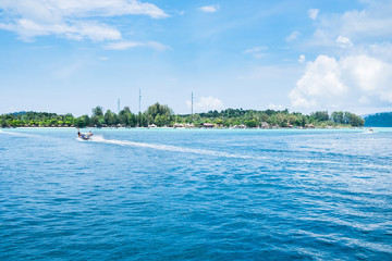 Fototapeta na wymiar Island blue sea with resort on beach, most abundant coral reef at lipe island,thailand