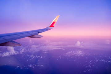 View airplane cloudy blue colorful on sky