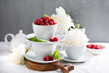 Fresh raspberries in stacked cups