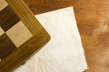 Chess board and paper