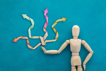 wood man figure presenting and showing solution plan.jpg