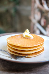 Stacked pancake on wooden table
