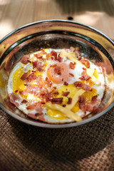 Indochina pan-fried egg place on linen weave