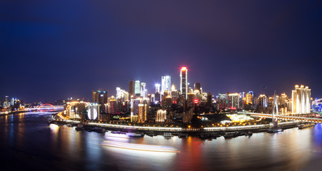 Fototapeta na wymiar cityscape and skyline of downtown near water of chongqing night