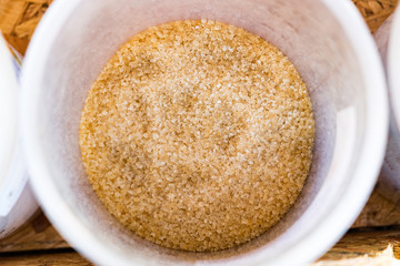 Granulated sugar in container sphere,top view