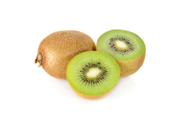 whole and cut fresh kiwi on white background